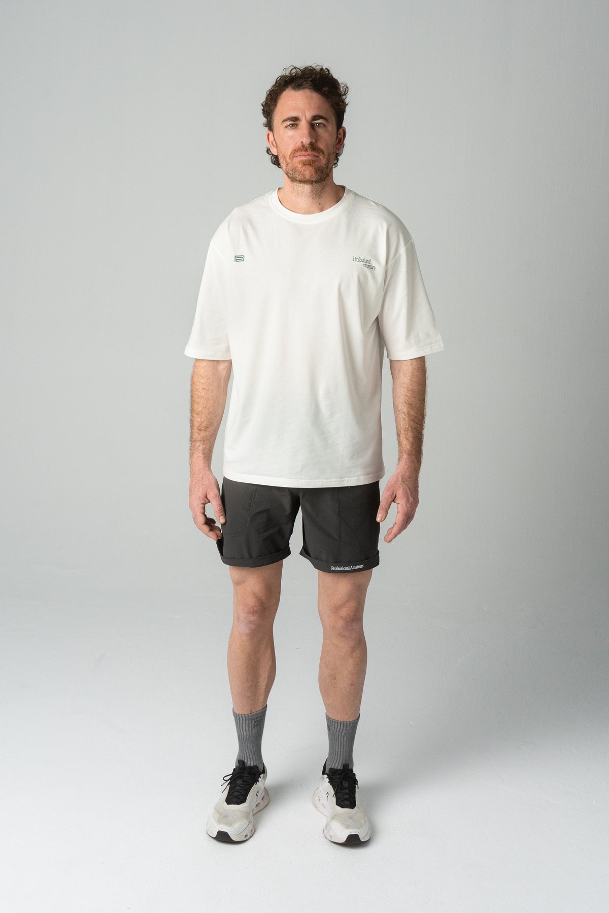 Reverse logo training man tee