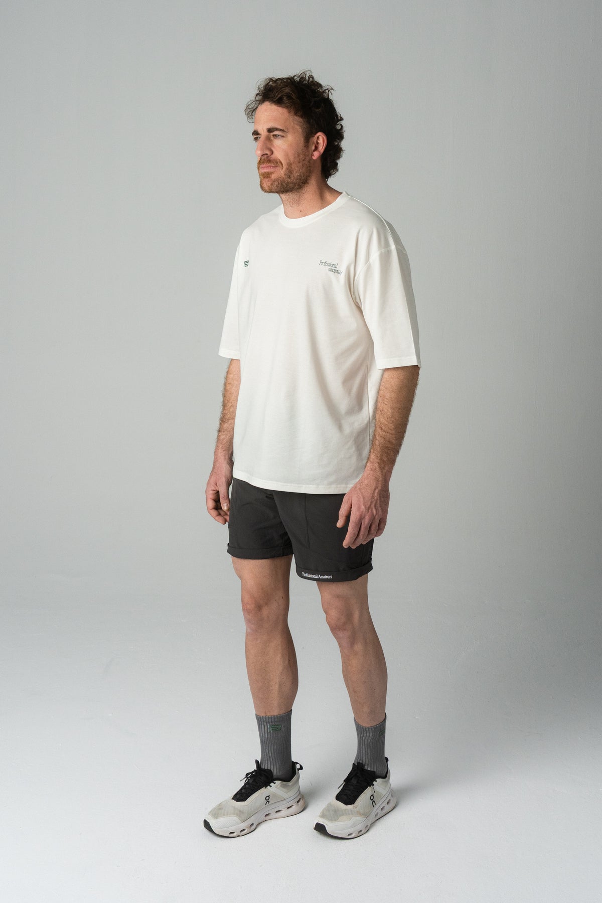 Reverse logo training man tee