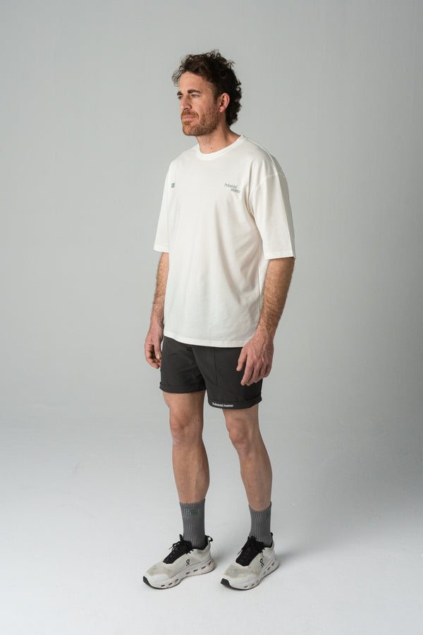 Reverse logo training man tee